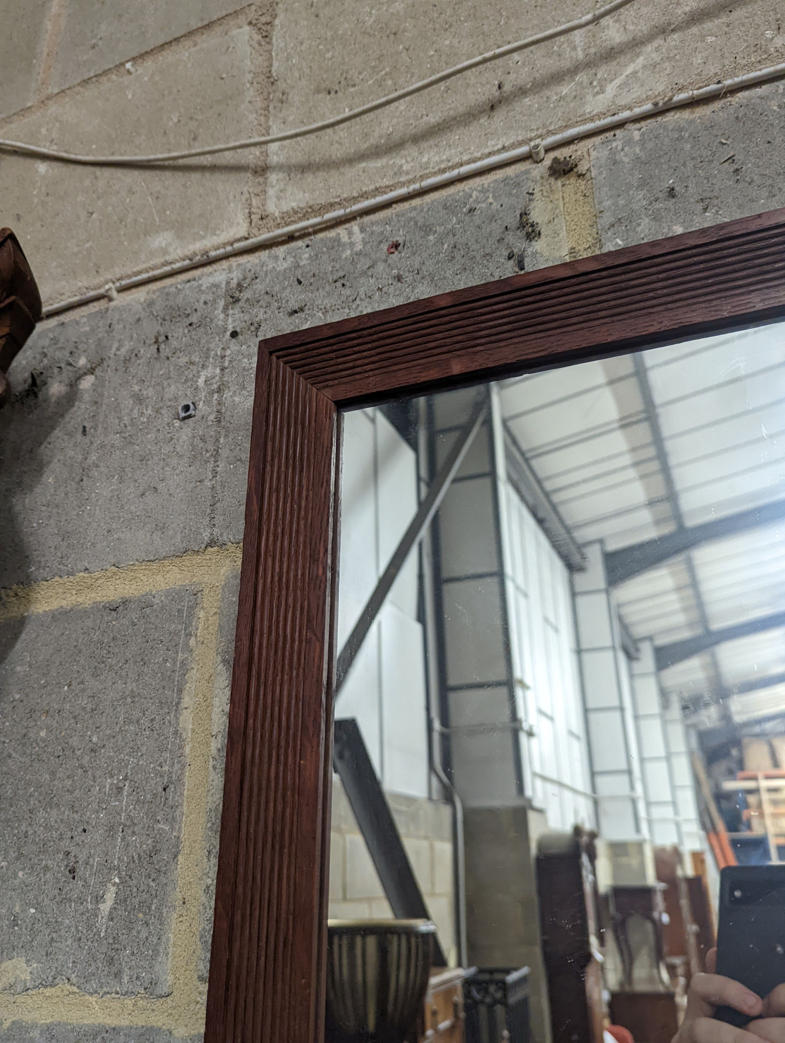 An oak framed rectangular wall mirror with fluted border, width 79cm, height 99cm